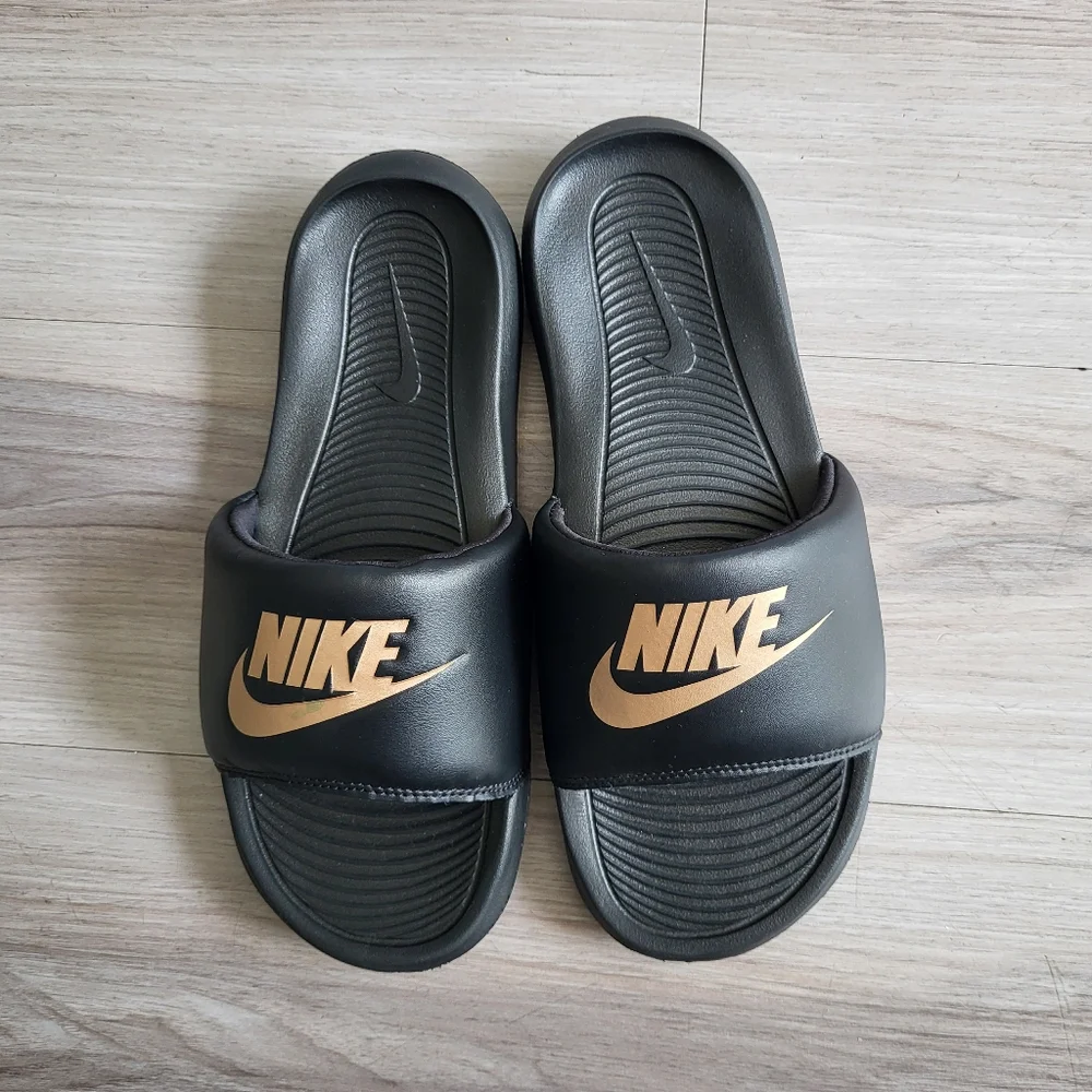 Nike Black Slides with Gold Logo